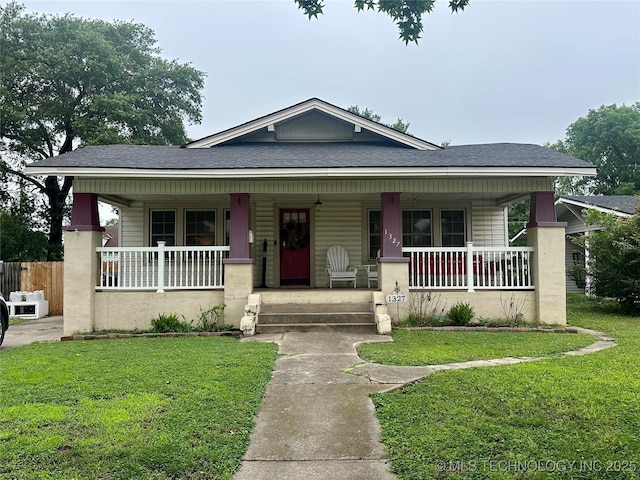 1327 E 10th St, Okmulgee, OK 74447 - bungalow-style house with a porch and roof with shingles