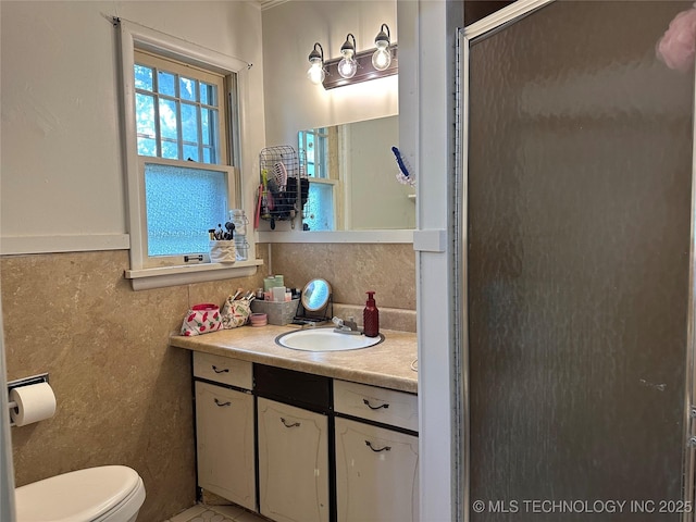 1327 E 10th St, Okmulgee, OK 74447 - bathroom with vanity and an enclosed shower