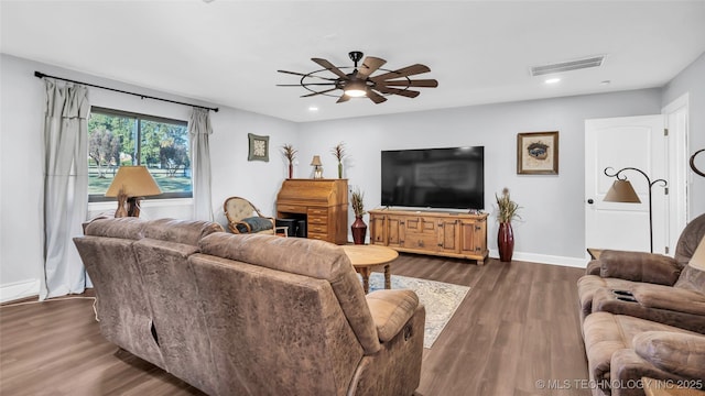 6063 Wilson, Durant, OK 74701 - living area with a ceiling fan, dark wood-type flooring, recessed lighting, and baseboards
