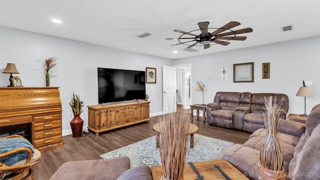 6063 Wilson, Durant, OK 74701 - living room with ceiling fan, baseboards, recessed lighting, and wood finished floors
