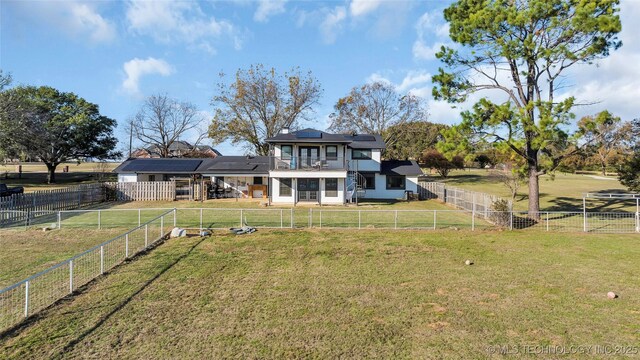 6063 Wilson, Durant, OK 74701 - back of property with a sunroom
