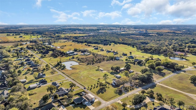 6063 Wilson, Durant, OK 74701 - aerial view of property and surrounding area featuring a nearby body of water