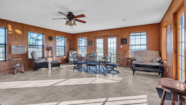 6063 Wilson, Durant, OK 74701 - dining space with wooden walls and a ceiling fan