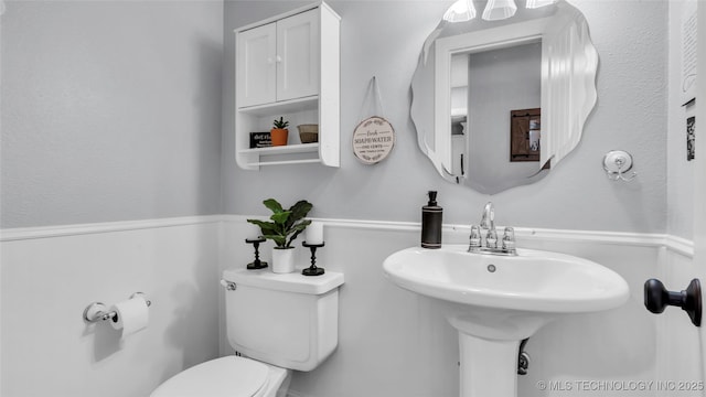 6063 Wilson, Durant, OK 74701 - bathroom with toilet