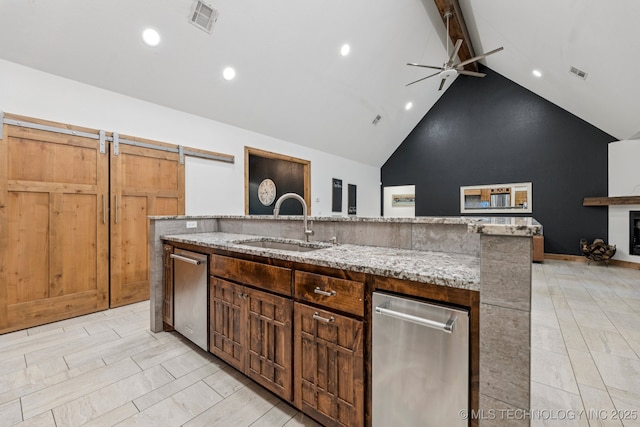 15303 Foreacre Cir, Sapulpa, OK 74066 - kitchen featuring a sink, stainless steel dishwasher, beam ceiling, ceiling fan, and light stone countertops