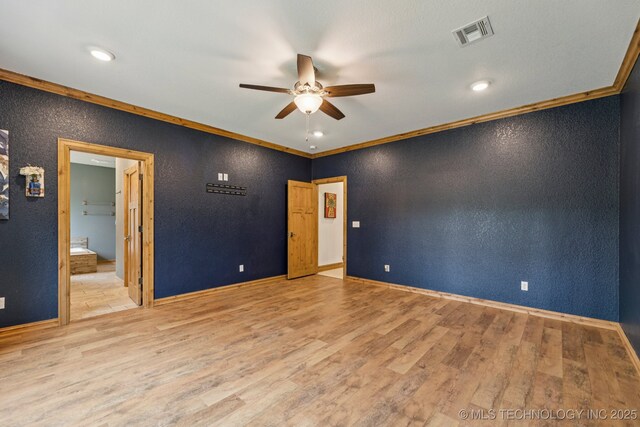 15303 Foreacre Cir, Sapulpa, OK 74066 - empty room featuring a ceiling fan, a textured wall, wood finished floors, ornamental molding, and baseboards