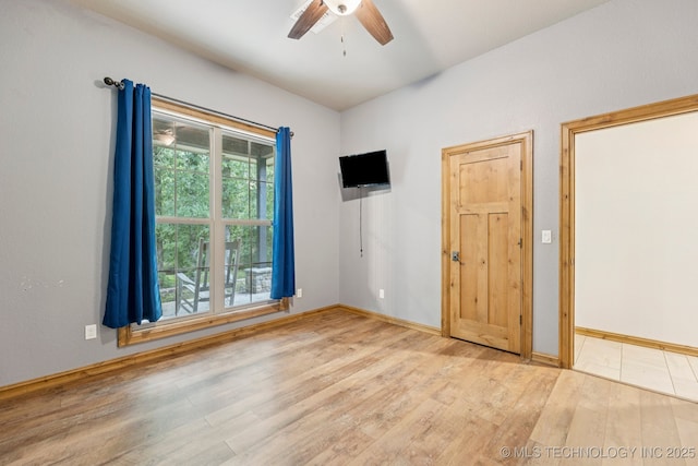 15303 Foreacre Cir, Sapulpa, OK 74066 - unfurnished room featuring wood finished floors, a ceiling fan, and baseboards