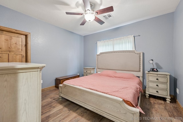 15303 Foreacre Cir, Sapulpa, OK 74066 - bedroom featuring wood finished floors, baseboards, and ceiling fan
