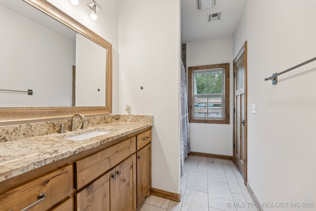 15303 Foreacre Cir, Sapulpa, OK 74066 - bathroom with vanity and baseboards
