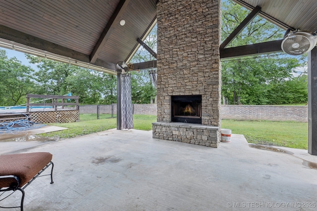 15303 Foreacre Cir, Sapulpa, OK 74066 - view of patio / terrace featuring an outdoor stone fireplace and a gazebo