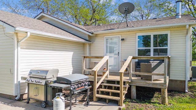 11860 N 68th W Ave, Sperry, OK 74073 - view of exterior entry featuring a wooden deck and a shingled roof