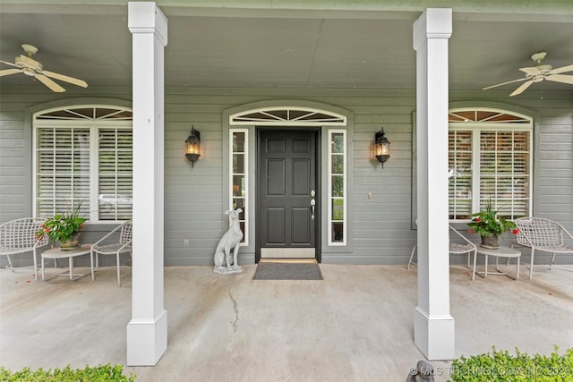 5070 Lake Breeze Rd, Grove, OK 74344 - view of exterior entry with a ceiling fan and a porch