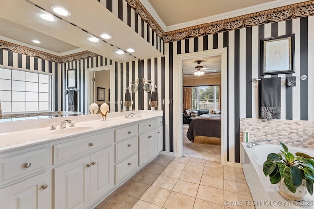 5070 Lake Breeze Rd, Grove, OK 74344 - full bathroom with wallpapered walls, double vanity, connected bathroom, a bath, and tile patterned flooring