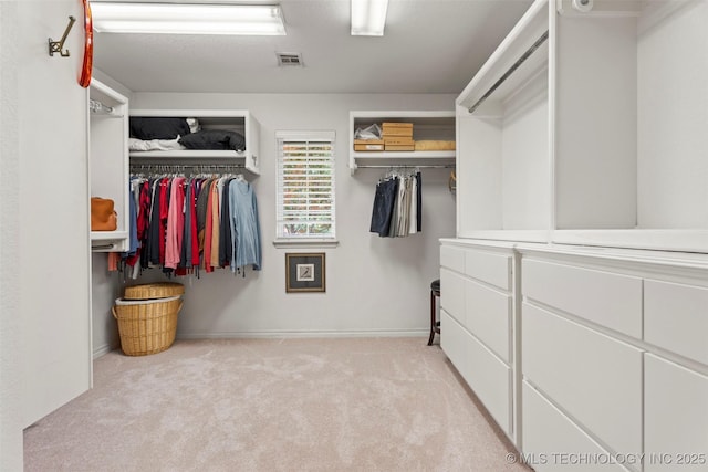 5070 Lake Breeze Rd, Grove, OK 74344 - walk in closet featuring light colored carpet