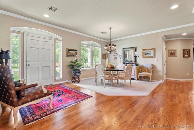 5070 Lake Breeze Rd, Grove, OK 74344 - dining room with a chandelier, light wood-style floors, ornamental molding, and recessed lighting