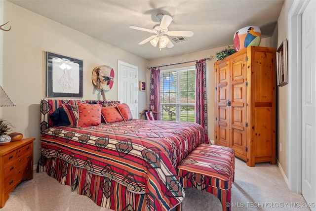 5070 Lake Breeze Rd, Grove, OK 74344 - bedroom with light colored carpet and ceiling fan