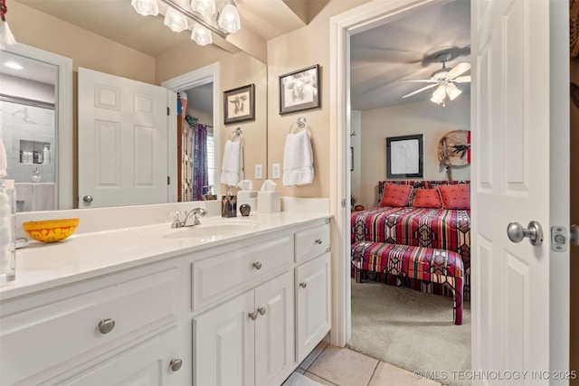 5070 Lake Breeze Rd, Grove, OK 74344 - ensuite bathroom with vanity, tile patterned flooring, and a ceiling fan