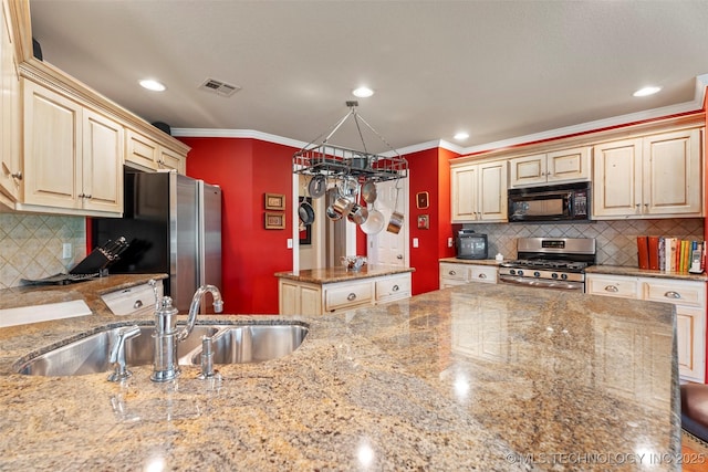 5070 Lake Breeze Rd, Grove, OK 74344 - kitchen featuring stainless steel appliances, light stone countertops, tasteful backsplash, ornamental molding, and a center island