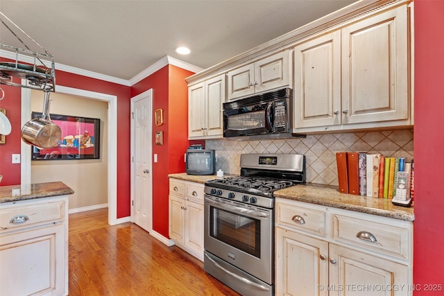 5070 Lake Breeze Rd, Grove, OK 74344 - kitchen featuring gas range, black microwave, backsplash, ornamental molding, and light wood-type flooring