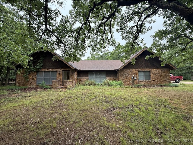 1808 N Woodland, Drumright, OK 74030 - single story home featuring stone siding and a front yard