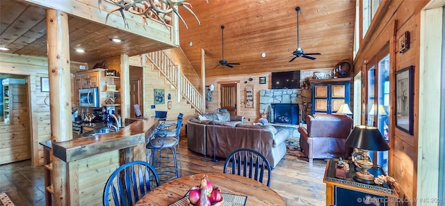 116433 S 4210th Rd, Eufaula, OK 74432 - dining area with wooden walls, wood ceiling, hardwood / wood-style flooring, ceiling fan, and lofted ceiling