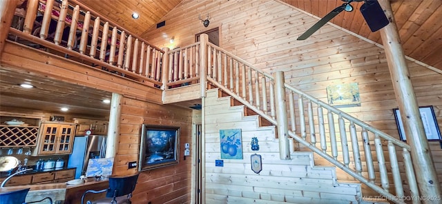 116433 S 4210th Rd, Eufaula, OK 74432 - staircase with high vaulted ceiling, wooden walls, wood ceiling, and recessed lighting