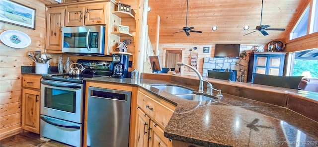 116433 S 4210th Rd, Eufaula, OK 74432 - kitchen featuring appliances with stainless steel finishes, wood walls, a sink, a ceiling fan, and wooden ceiling