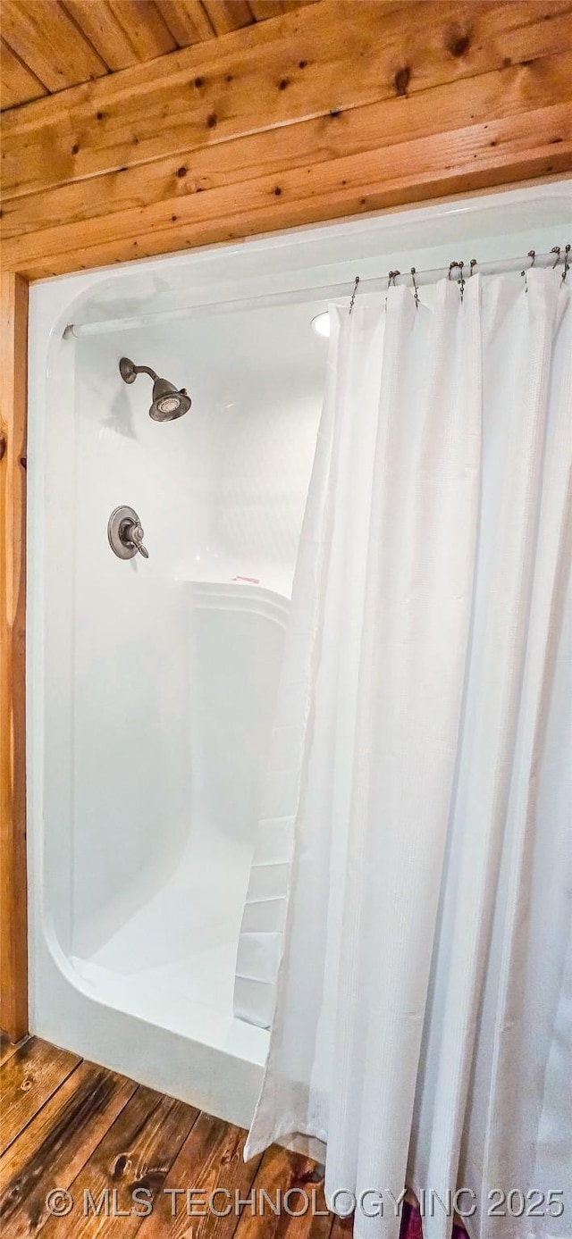 116433 S 4210th Rd, Eufaula, OK 74432 - bathroom featuring wood finished floors and a shower with curtain