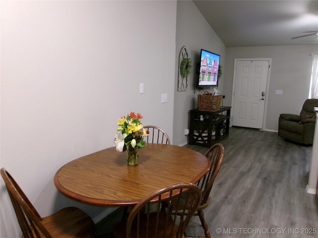 7882 E 132nd Pl S, Bixby, OK 74008 - dining area with wood finished floors, ceiling fan, lofted ceiling, and baseboards
