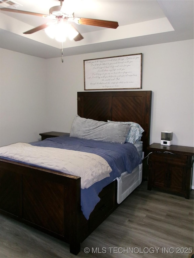 7882 E 132nd Pl S, Bixby, OK 74008 - bedroom with wood finished floors and ceiling fan