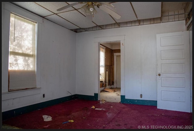 425 W Southside Blvd, Muskogee, OK 74401 - spare room featuring a ceiling fan, plenty of natural light, and baseboards