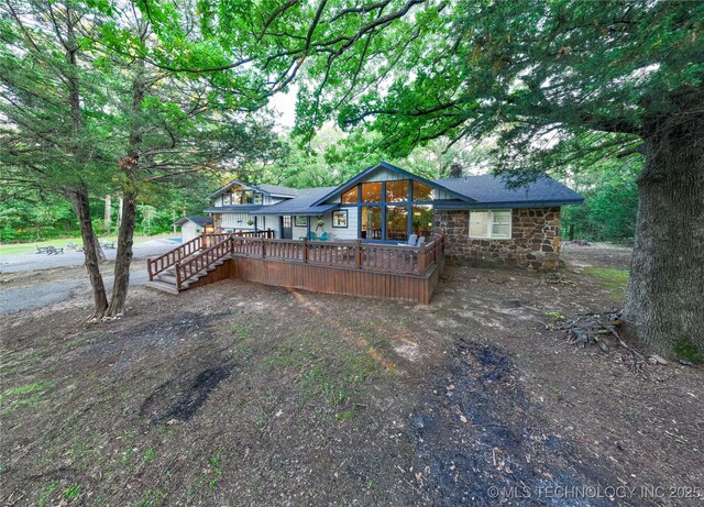 18341 W Woodhaven, Cookson, OK 74427 - back of property with stone siding and a deck