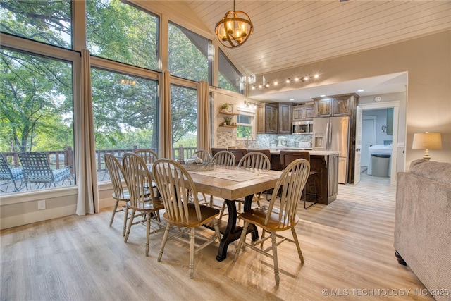 18341 W Woodhaven, Cookson, OK 74427 - dining area featuring vaulted ceiling, wooden ceiling, light wood finished floors, a chandelier, and baseboards