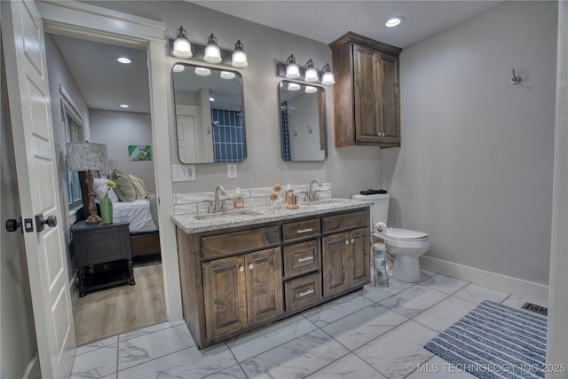 18341 W Woodhaven, Cookson, OK 74427 - full bath featuring marble finish flooring, double vanity, baseboards, toilet, and recessed lighting