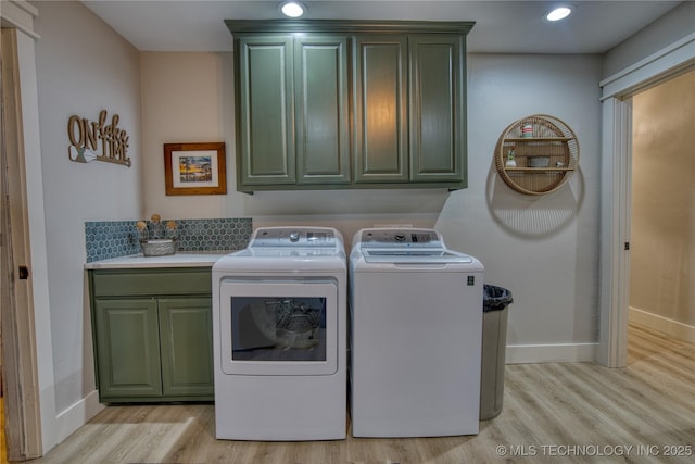 18341 W Woodhaven, Cookson, OK 74427 - washroom featuring cabinet space, light wood-style flooring, washing machine and clothes dryer, baseboards, and recessed lighting