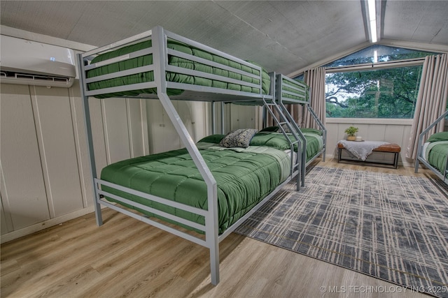 18341 W Woodhaven, Cookson, OK 74427 - bedroom featuring vaulted ceiling, wood finished floors, and an AC wall unit
