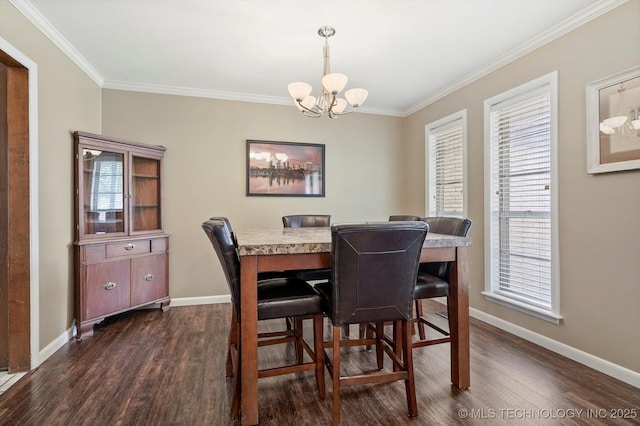 7329 E 66th Ct, Tulsa, OK 74133 - dining area featuring a chandelier, crown molding, dark wood-type flooring, and baseboards