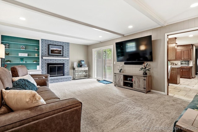 7329 E 66th Ct, Tulsa, OK 74133 - living room with beamed ceiling, light colored carpet, a fireplace, crown molding, and recessed lighting