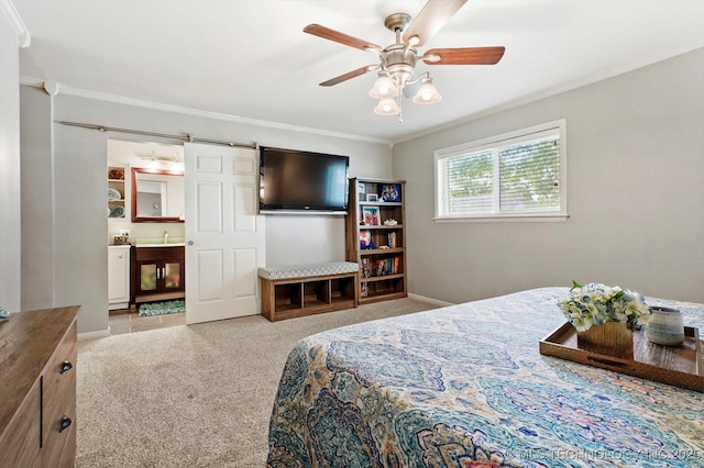 7329 E 66th Ct, Tulsa, OK 74133 - carpeted bedroom with crown molding, ensuite bathroom, ceiling fan, baseboards, and a sink