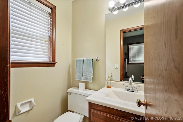 7329 E 66th Ct, Tulsa, OK 74133 - half bathroom featuring toilet and vanity