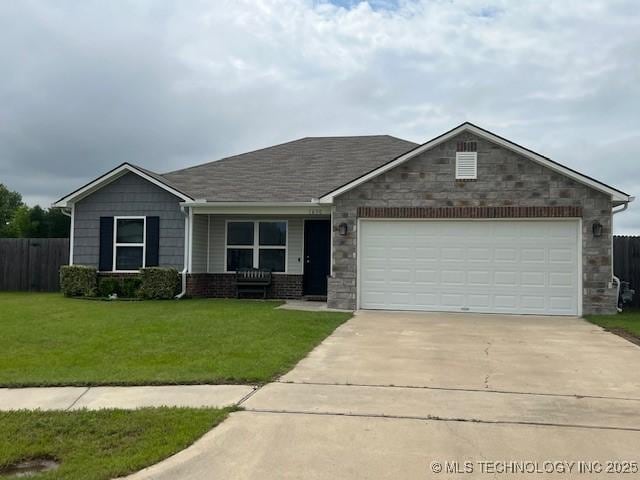 1630 S 31st Ct, Broken Arrow, OK 74014 - view of front of home with driveway, an attached garage, and stone siding