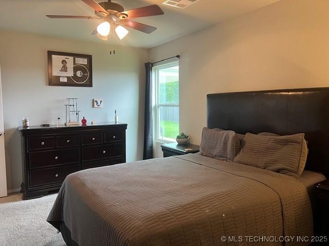 1630 S 31st Ct, Broken Arrow, OK 74014 - carpeted bedroom featuring ceiling fan