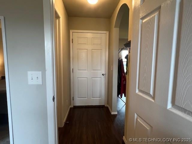 1630 S 31st Ct, Broken Arrow, OK 74014 - corridor with arched walkways, dark wood-style flooring, and baseboards