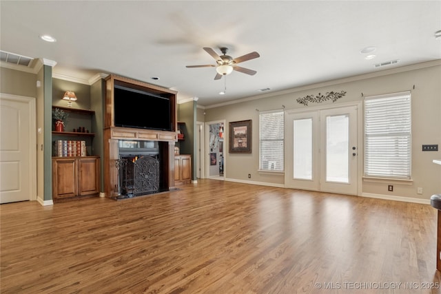 18578 S 269th E Ave, Haskell, OK 74436 - unfurnished living room featuring a fireplace, a ceiling fan, wood finished floors, ornamental molding, and baseboards