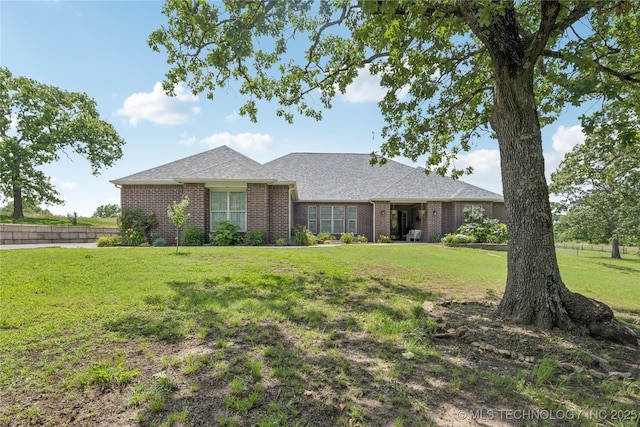 18578 S 269th E Ave, Haskell, OK 74436 - ranch-style home with brick siding, a front yard, and a shingled roof