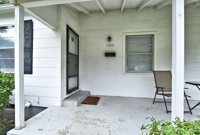 1373 E 42nd Pl N, Tulsa, OK 74105 - view of exterior entry with concrete block siding