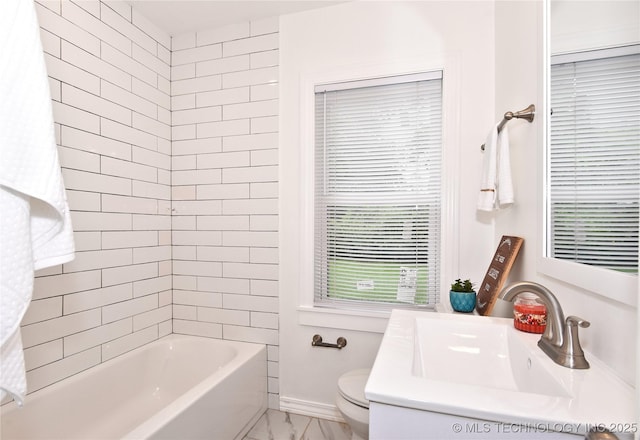 1373 E 42nd Pl N, Tulsa, OK 74105 - bathroom with toilet, vanity, marble look tile flooring, and tub / shower combination