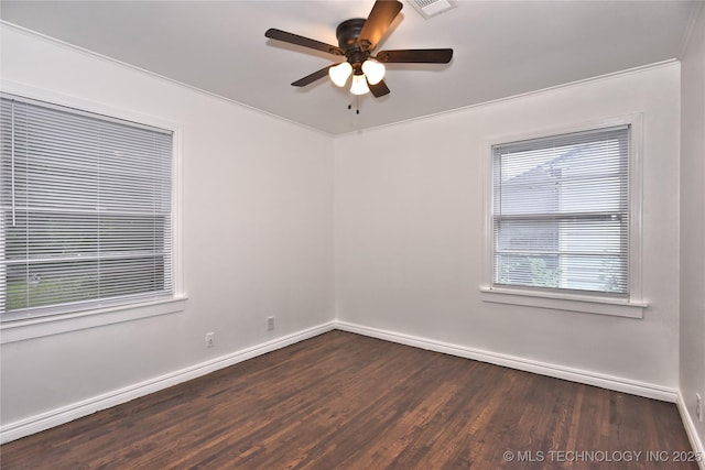 1373 E 42nd Pl N, Tulsa, OK 74105 - spare room with baseboards, dark wood finished floors, and a ceiling fan