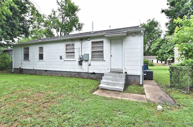 1373 E 42nd Pl N, Tulsa, OK 74105 - rear view of property with crawl space and entry steps