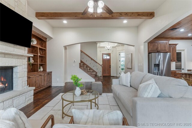 5314 E 125th St S, Bixby, OK 74008 - living room with wood finished floors, arched walkways, stairs, recessed lighting, and beam ceiling